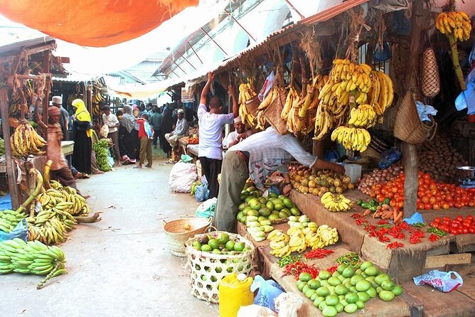 A Private Full Day Tour To Stone Town & Spice Farm - Coconut climbing and the more playful side