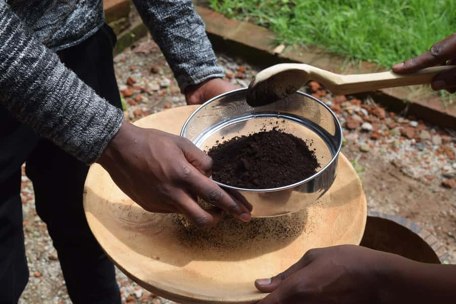 Arusha: Coffee Tour - The mortar, songs, and first round of grinding