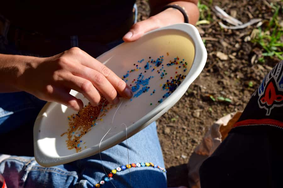 Arusha: Maasai-style Beaded Jewelry Lesson - Adding the homemade brunch