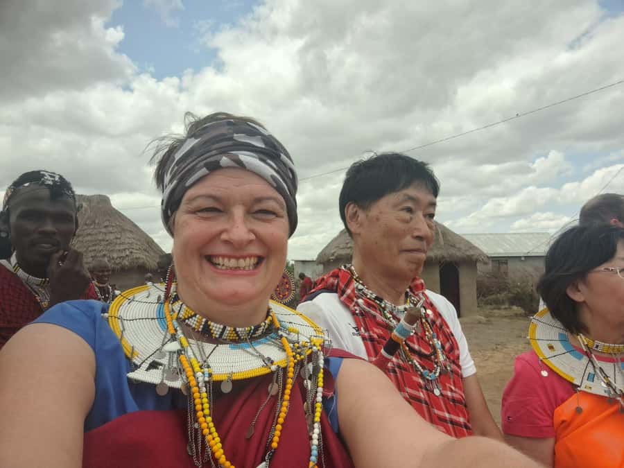 Arusha: Maasai Village Tour - Wearing Maasai clothing and joining the dance