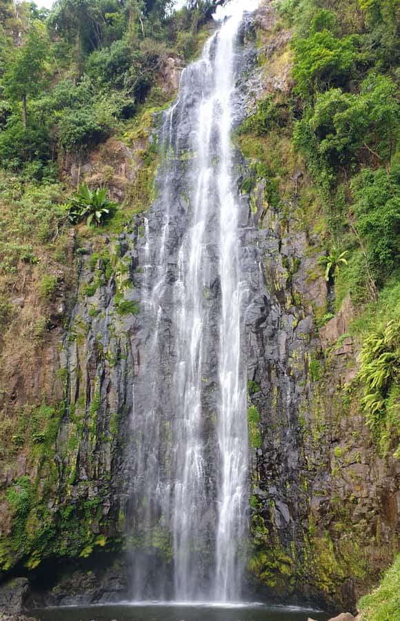 Arusha: Materuni Waterfalls, Hot Springs and/or Coffee Tour - Walking down to the 85-meter waterfall