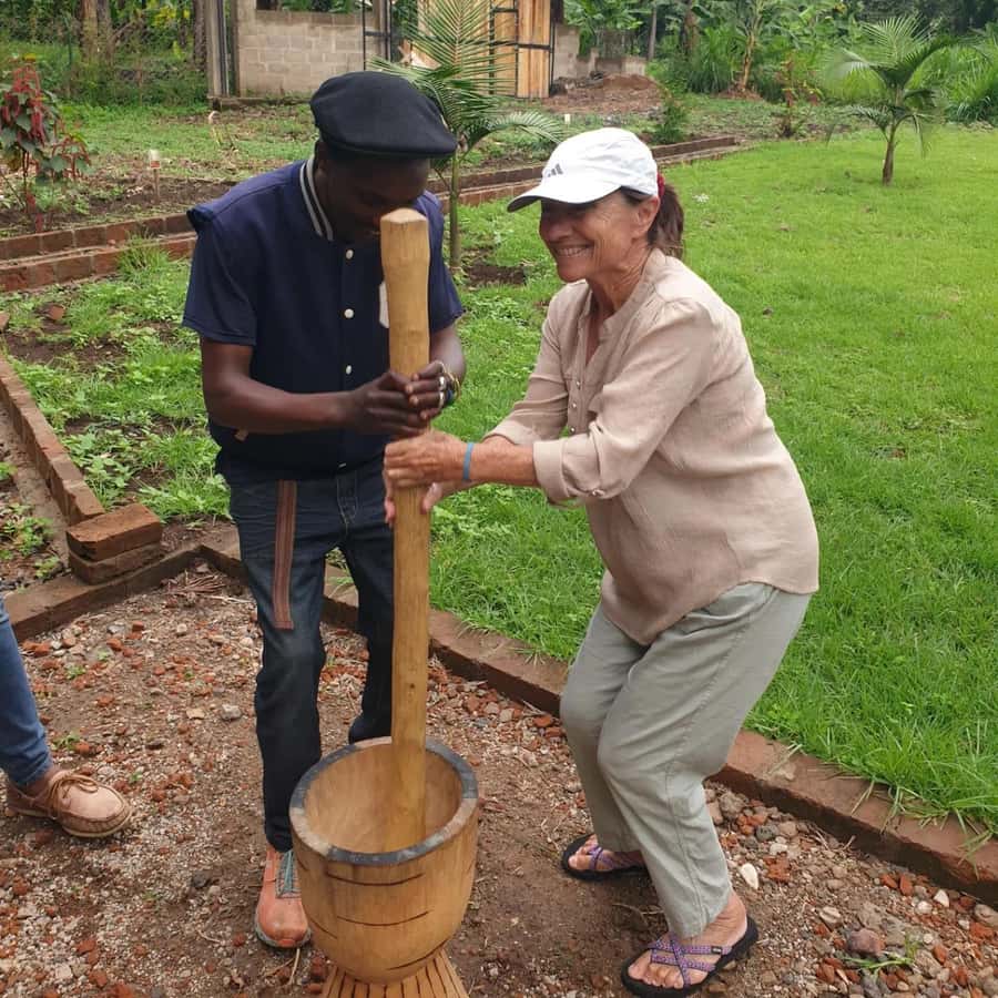 Arusha: Traditional Coffee Preparation(coffee tour) - Pounding beans with a wooden mortar