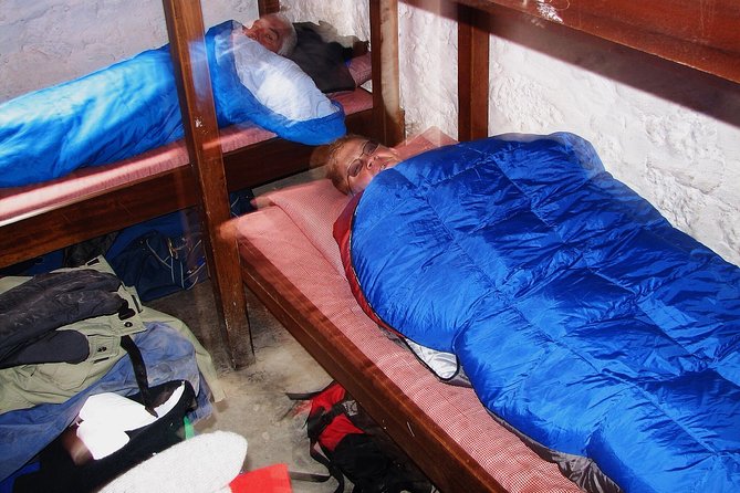 Conquer Kilimanjaro: 5-Day Marangu Route Adventure - Meals, water, huts, and the mountain crew