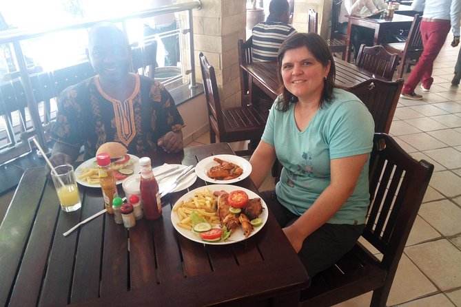 Dar es Salaam City Walking tour - Explore the Life of the Local People! - Mwenge Curio Shops add a shopping stop