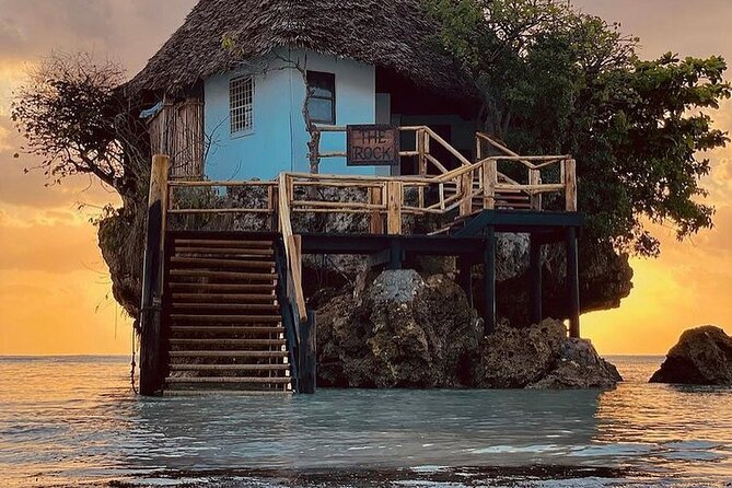 Dolphin Tour; Kuza Cave Tour; Paje Beach; The Rock Restaurant; Jozani Forest - Mnemba Island Atoll: dolphins, reef fish, and a shallow sandbank