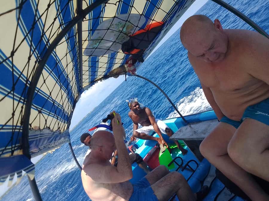 Dolphins & Snorkeling Zanzibar: Mnemba Island Tour - Two hours over coral and tropical fish