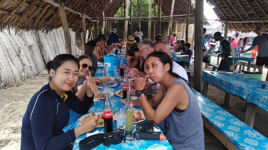 From Stone Town: Sandbank picnic with sea food BBQ Lunch - A sandbank break with tropical fruit