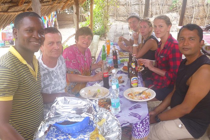 Kwale Island Dhow Sailing Tour from Zanzibar with Seafood Lunch - Walking to the old baobab tree