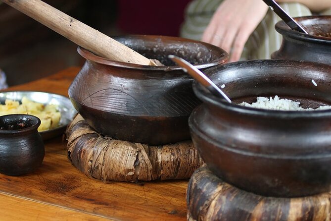 Maasai village visit, Materuni waterfalls & coffee experience - Making coffee with Chagga hosts