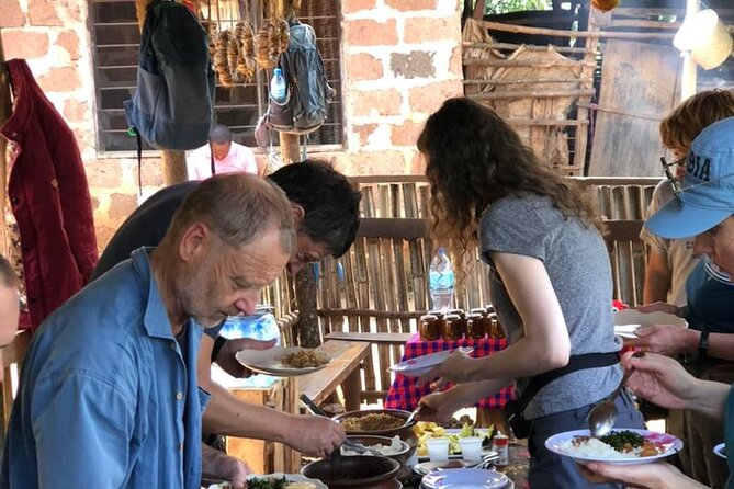 Materuni Waterfall Coffee Tour and Chemka Hot Springs Experience - Coffee preparation with the Chagga community
