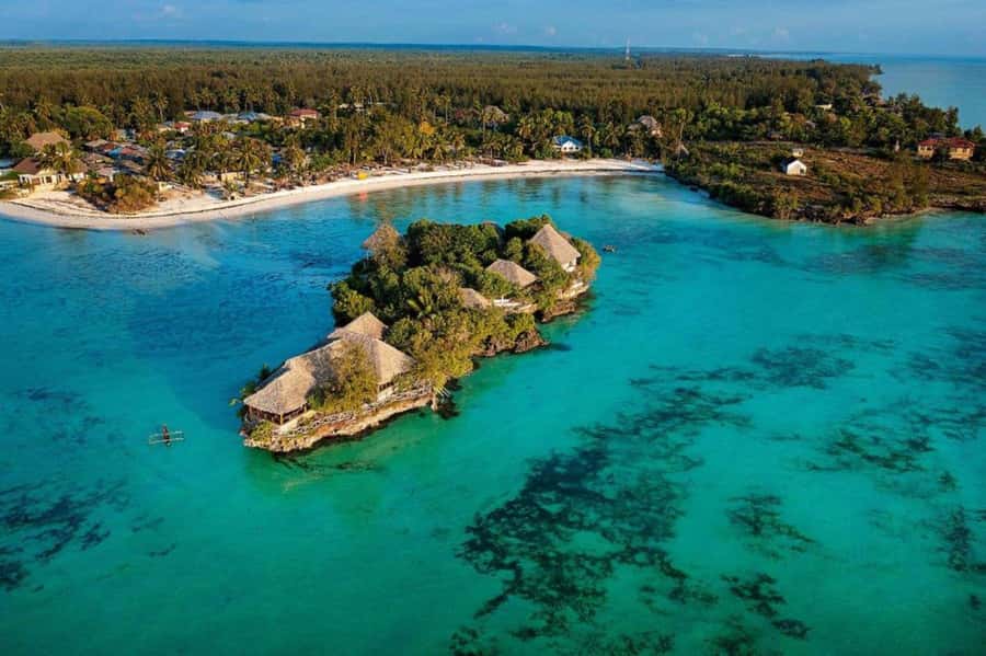 Mnemba Island, The Island Pongwe, Blue Lagoon Tour, The Rock - The Island Pongwe brings the coast into view
