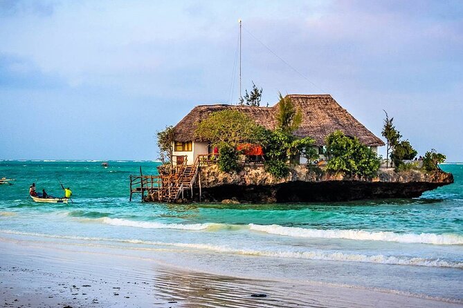 Mnemba Snorkeling; Kuza Cave; Paje Beach; The Rock; Salaam Cave - What this 11-hour Zanzibar tour is really like