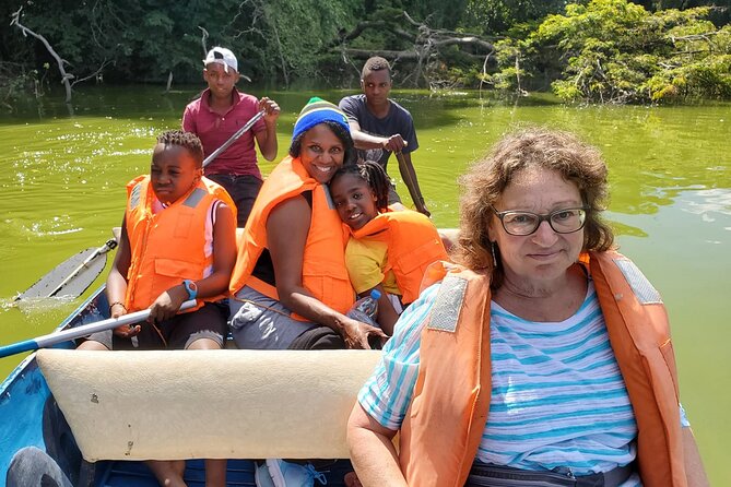 Private Canoe or Hike Tour on Lake Duluti - Canoeing on calm water, with birds overhead