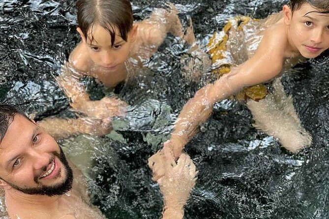 Private Tour to Marangu Waterfalls, Chagga Caves, Coffee tour & Hot Springs - Cooling off at Kikuletwa Hot Springs
