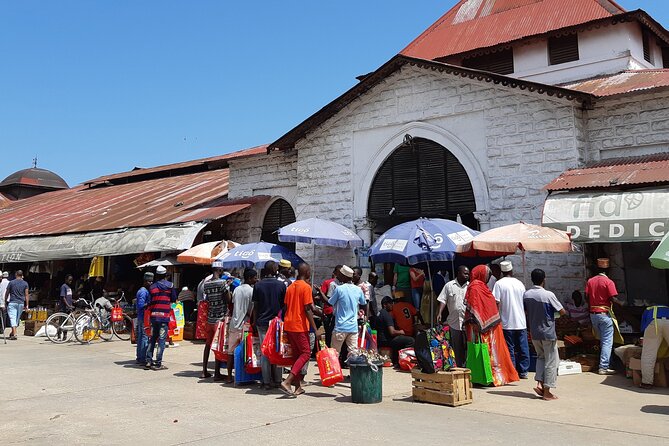 Private Tour Zanzibar Unique Stone Town with spice Farm Plantations - The coconut climber and spice table