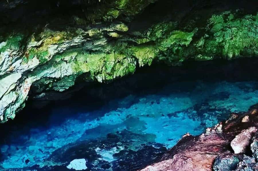 Salaam Cave Tour, Kuza Cave, Paje Beach, Lunch at The Rock - Your private pickup and the long road south