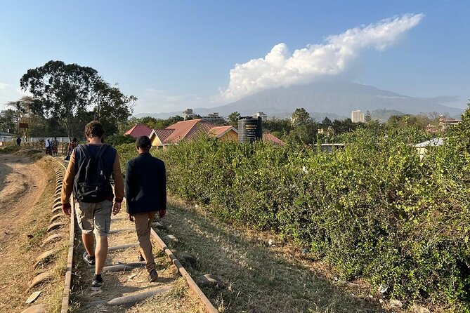 Street Food and Community Walking Tour - Walking from Kajo Art Gallery into Sinoni