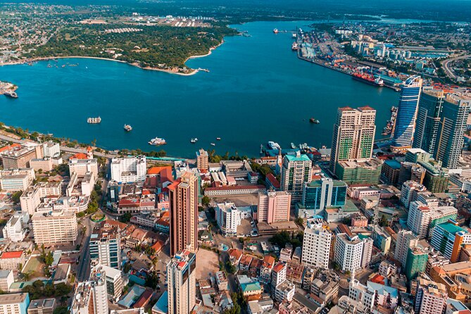 The Best/Top Rated Cultural City Tour in Dar es Salaam - Historic buildings appear between traffic and modern streets