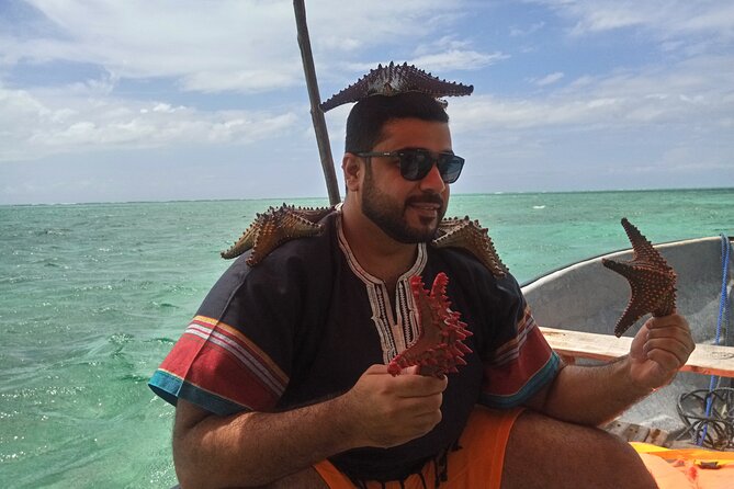 The Rock Restaurant & Blue Lagoon Half Day Tour in Zanzibar - Timing, pickup, and group size