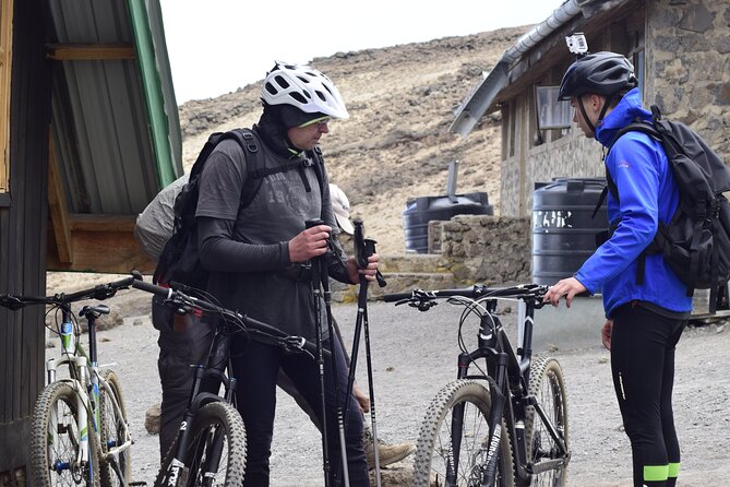 Top 6 Days Mt. Kilimanjaro Bike trek Tour by Marangu-Kilema Route - Day 5: Gilman’s Point, Uhuru Peak, and the long descent