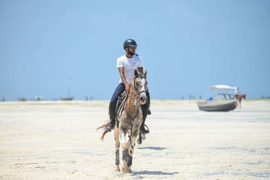 Zanzibar Horseback Riding - Riding across the white sand