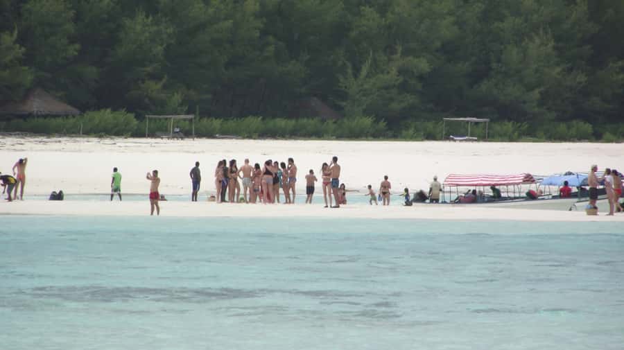 Zanzibar: Mnemba Atoll Marine Reserve Snorkeling Tour - Returning Past Unguja’s Fishing Boats