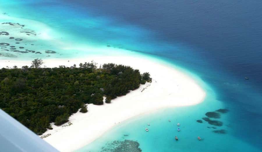 Zanzibar: Mnemba Island Atoll Guided Day Trip - A big Zanzibar day from $150