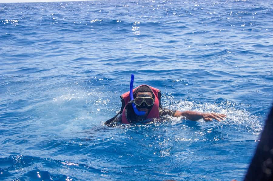Zanzibar: Mnemba island Snorkeling & Boat Tour with Lunch - Snorkeling among coral and tropical fish