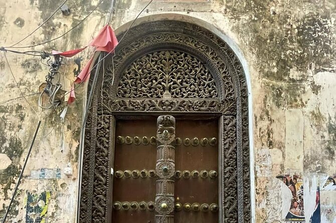 Zanzibar Stone Town: Historical Walking Tour With a Local Guide - Darajani Bazaar and the 1904 City Market