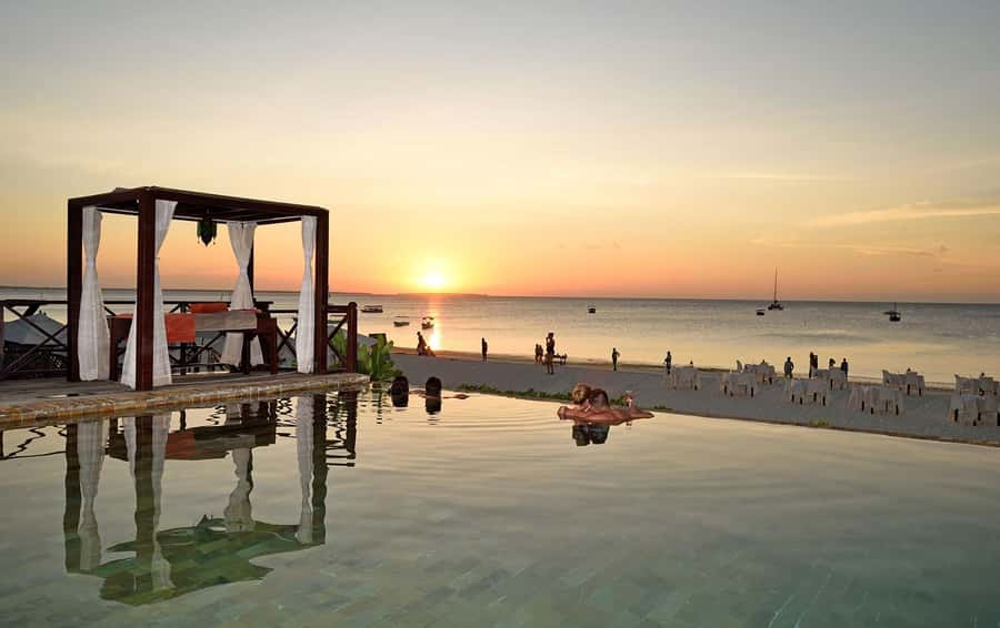 Zanzibar: Sunset Dhow Cruise With Pick Up - The optional swim and practical beach details