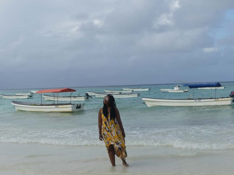 Zanzibar: Swimming with Dolphins and Snorkeling Private Tour - Fruit, snacks, and a quiet pause on the boat